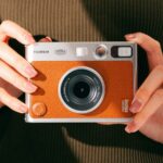 We_tested_Fujifilms_Instax_Mini_Evo_here_our_take-A_person_holds_the_Fujifilm_Camera-Credit_Elvis_Chung-2.renditionimage.900.900